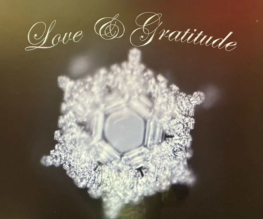 Snowflake crystal with the words Love & Gratitude in an artistic design.