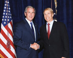 Dr. Larry Farwell meets with President George W. Bush