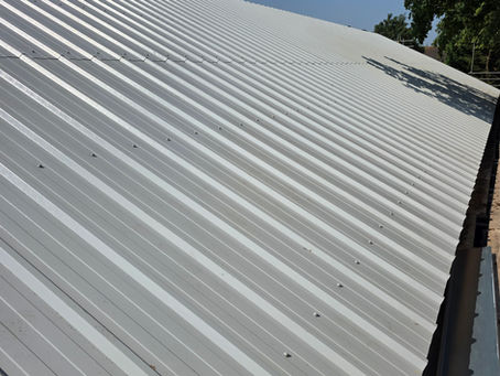 Boss Roofing & Cladding installing warehouse roofing and cladding for a UK industrial facility
