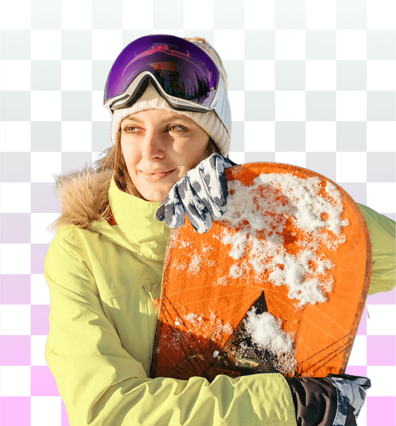 A woman standing with a snowboard, with a transparent background.