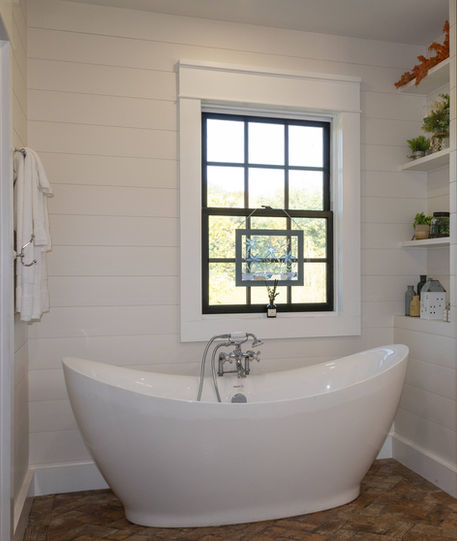 Contemporary bathroom with floating vanity, under-cabinet lighting, and LED backlit mirror