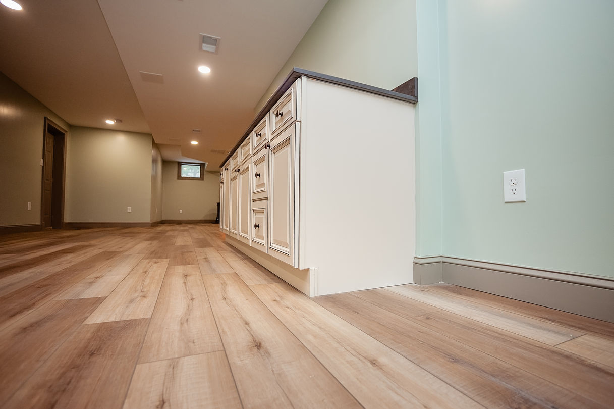  Basement game room with pool table and ambient lighting.

