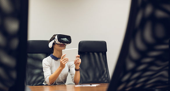 businesswoman-using-virtual-reality-headset.jpg