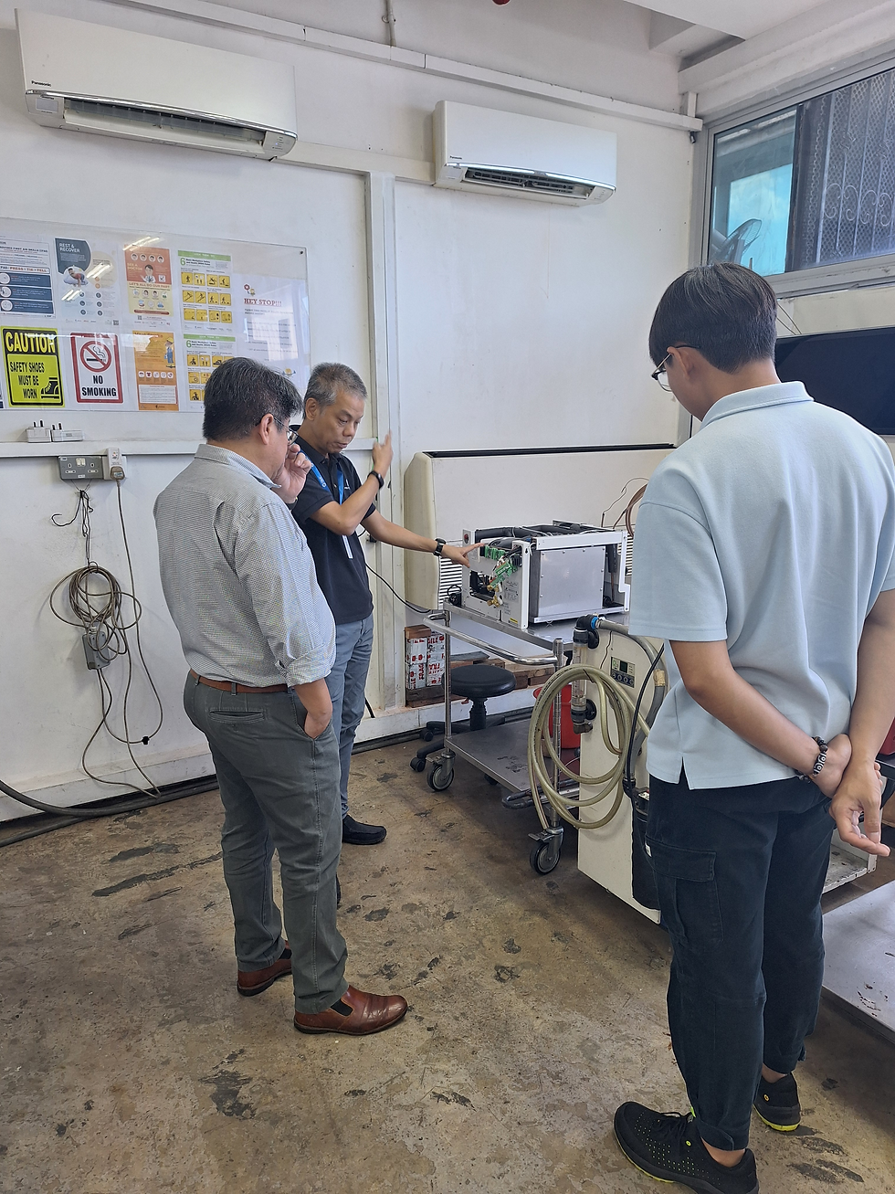 Founder Winson Zhang introducing Polytroniks c
hiller servicing workshop to visitor from Intest - Andy Chong.
