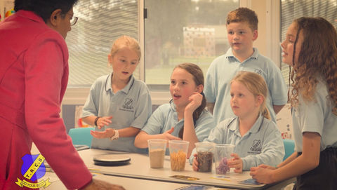 Teacher with school students