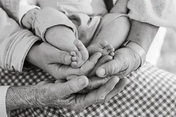 Hands with a baby