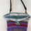 Thumbnail: Small purse with rock closure