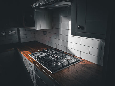 Bury Interiors Kitchen Fitting and Renovation.
Dark Oven Stove with Cupboards.
Bury Interiors | Bury Kitchen Fitting & Bathrooms