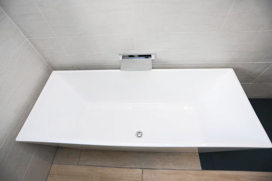Luxury Long White Bath Installation Bury Interiors