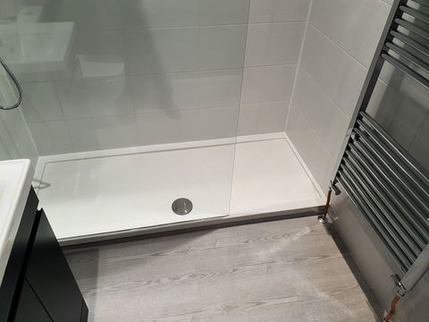 Bathroom with Red Wood floor. Bury Interiors.