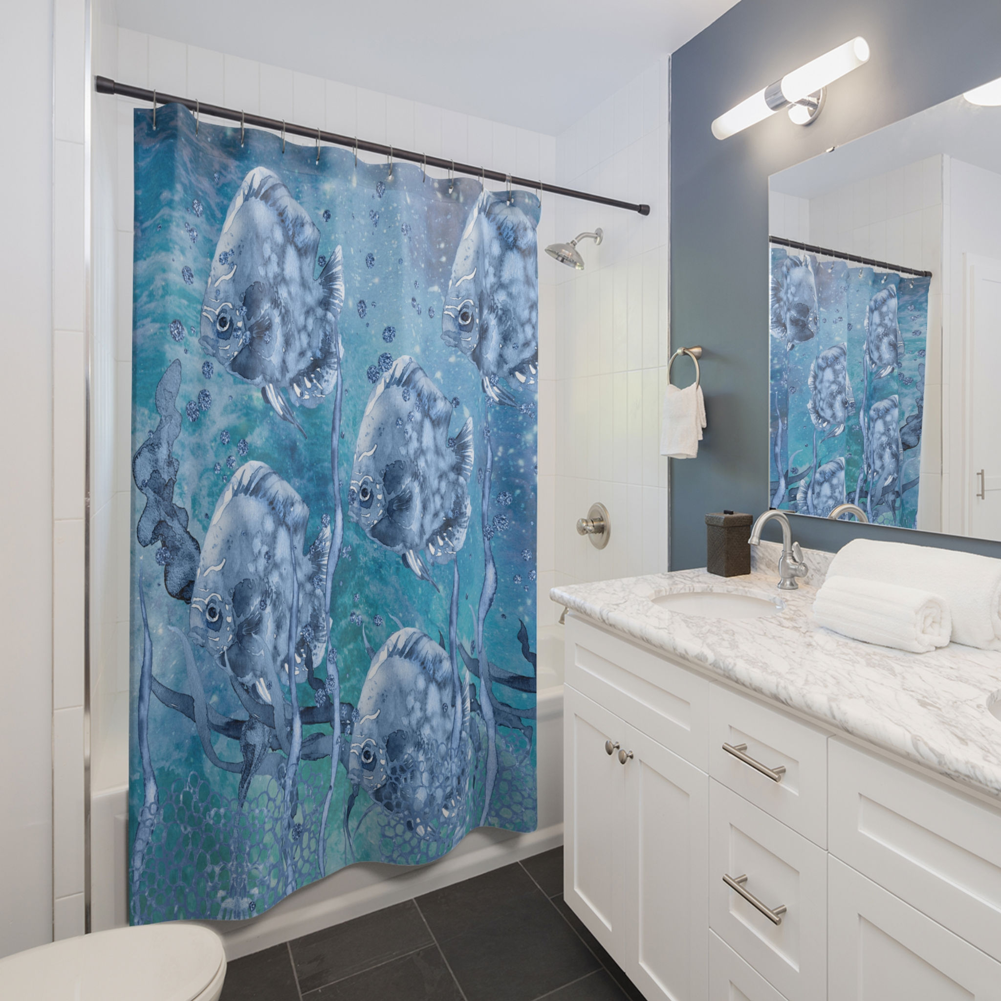 Deep blue sea watercolor underwater shower curtain displayed in a bathroom.
