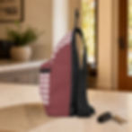 Left-side view of the Vintage Gray Red Gingham sling bag showing the adjustable black strap and side construction.