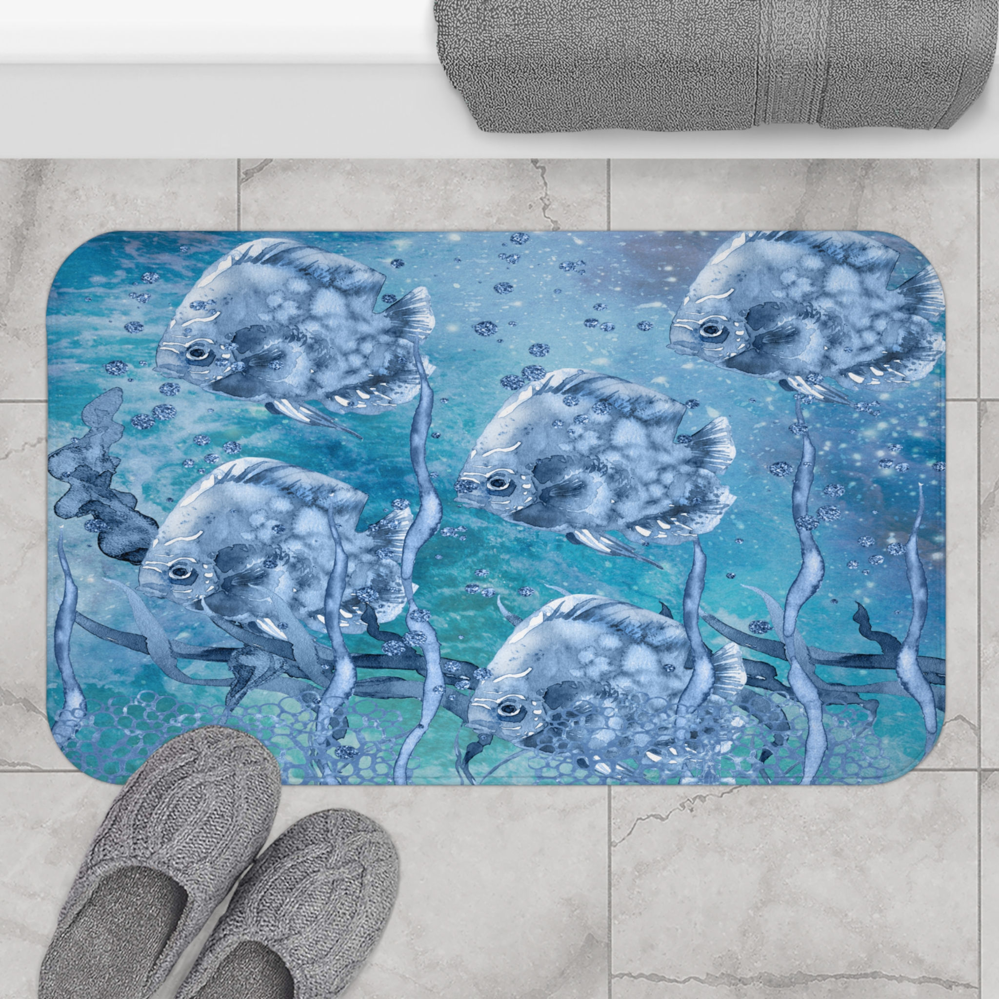 Deep Blue Sea Watercolor Underwater Fish Design Bath Mat displayed on a bathroom floor.
