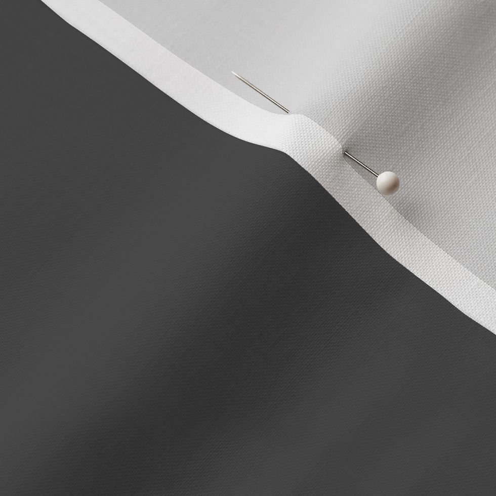 Close-up of Charcoal Linen Cotton Prima fabric showing the finished edge and texture.