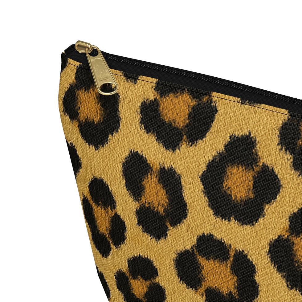 Thumbnail: Close-up of the golden leopard-print pouch with black zipper.