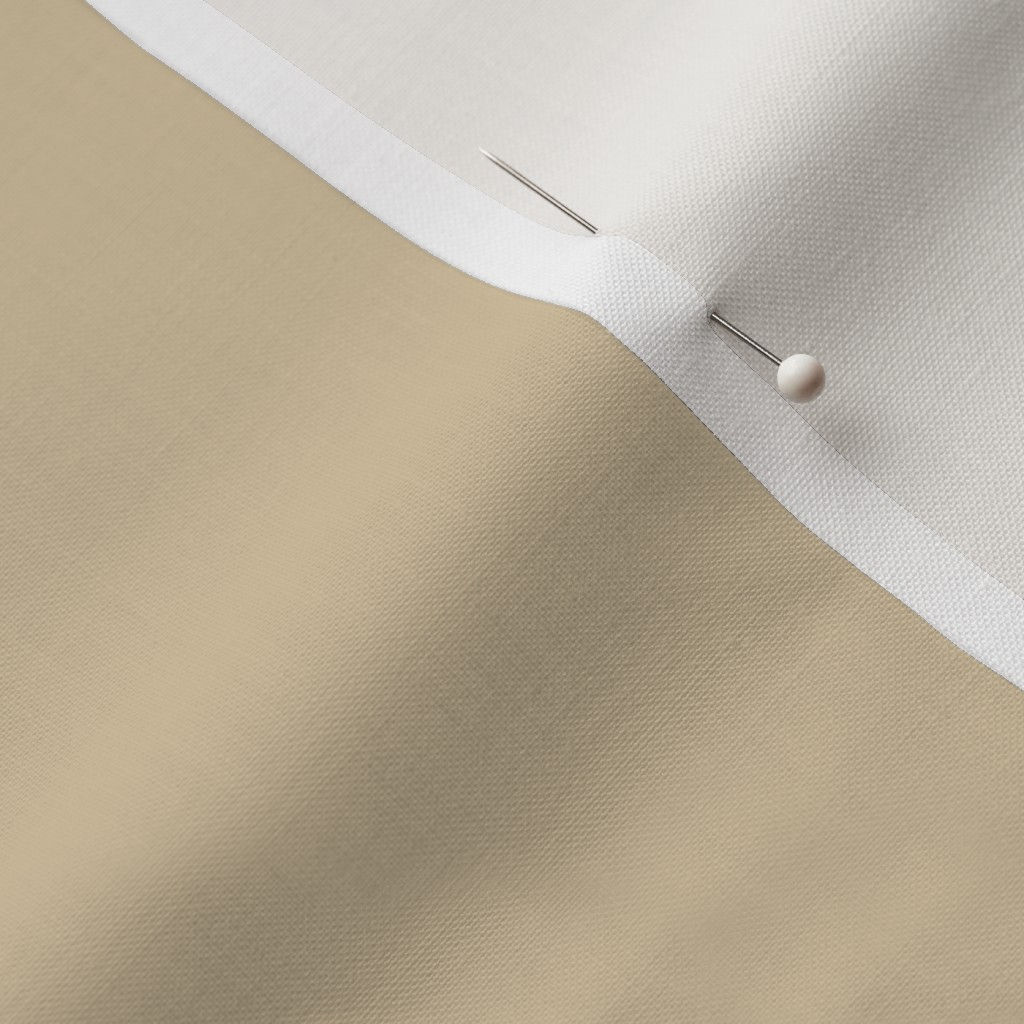 Close-up of vintage eggshell white polyester fabric showing the finished edge and texture.