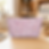 Dusty pink cherry blossom T-bottom pouch standing in a craft room.