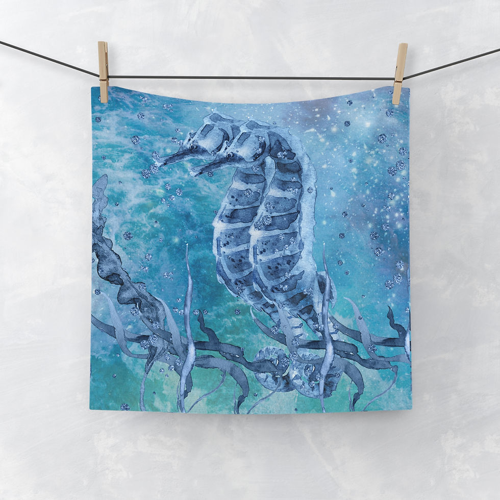 Deep Blue Sea Watercolor Seahorse Design Face Towel hanging on a clothesline