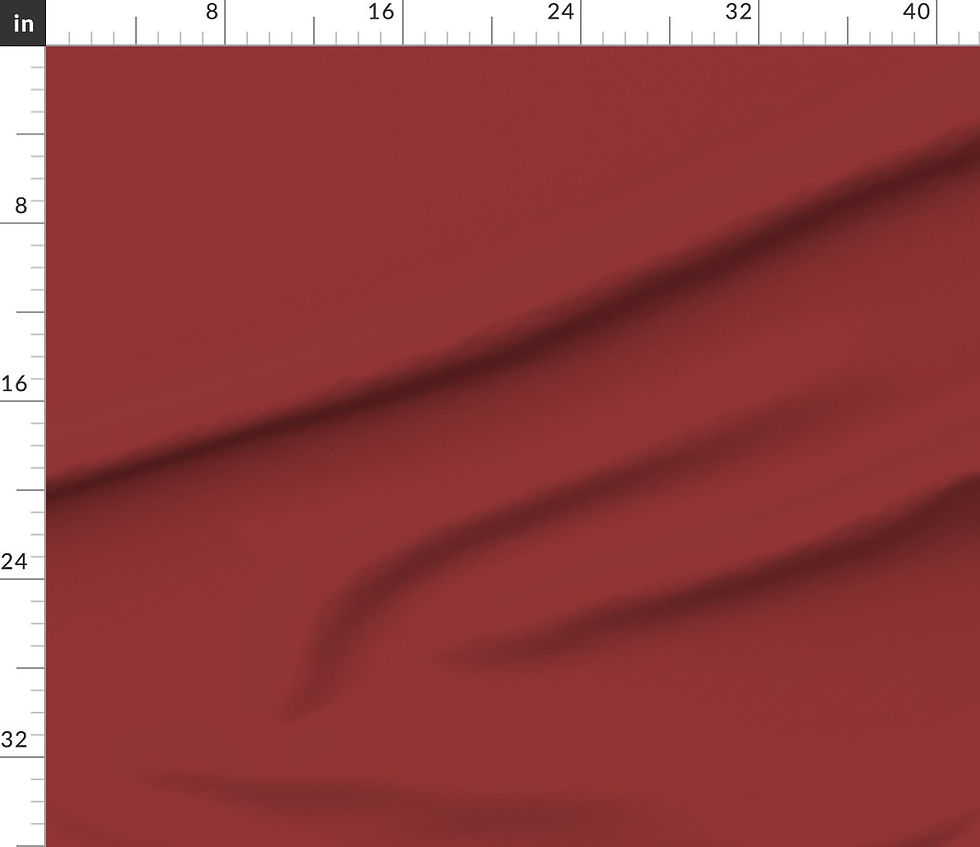 Close-up of Barn Red Cotton Prima fabric draped to show the fabric texture.