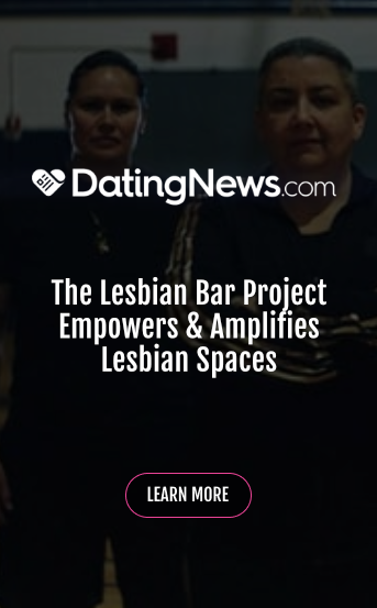Image of DatingNews.com logo with text in the center: The Lesbian Bar Project empowers & amplifies lesbian spaces. A button below says LEARN MORE.
