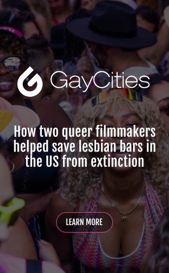 Image of GayCities logo with text in the center: Two queer filmmakers saved US lesbian bars from extinction. A button below says LEARN MORE