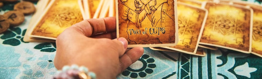 fortune-teller-reads-with-tarot-cards-selective-focus_73944-29959.jpg
