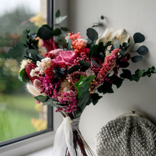 Bridal bouquet with preserved roses, hydrangeas and eucalyptus by Meadow Floristry