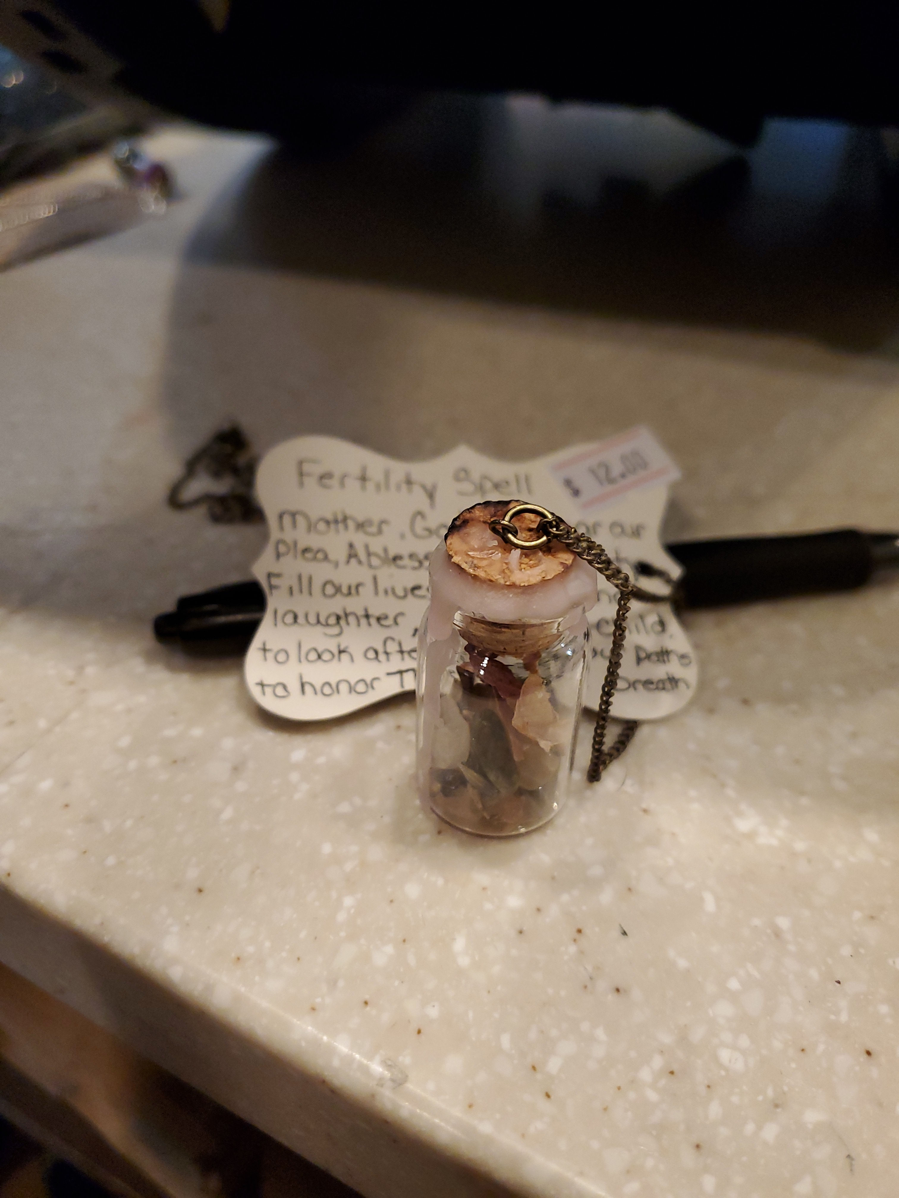 Fertility spell jar necklace 