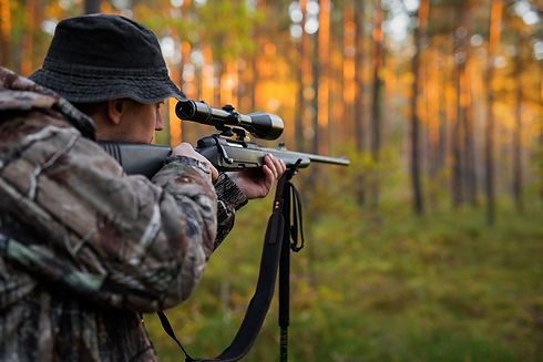hunter-aiming-with-rifle.jpeg