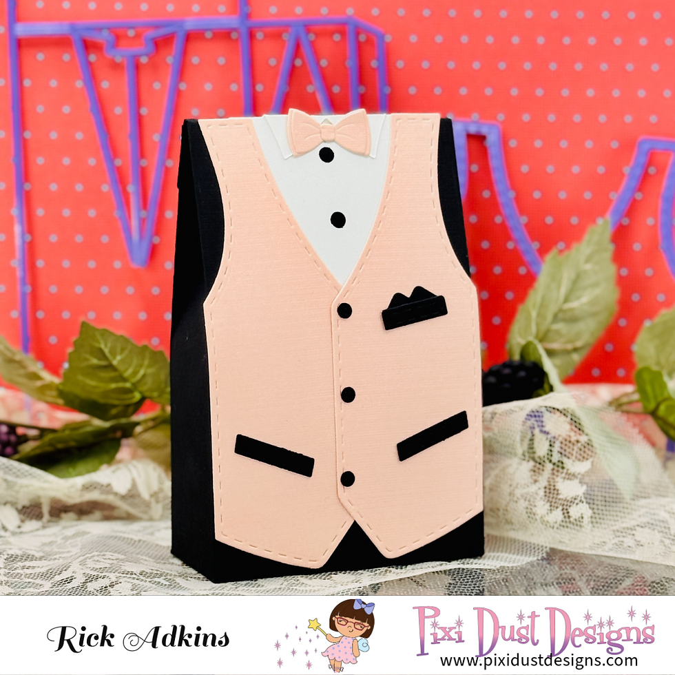 Gift box in shape of a tuxedo with a peach vest and bow tie. Polka dot background with leaves, and text reads "Pixi Dust Designs".