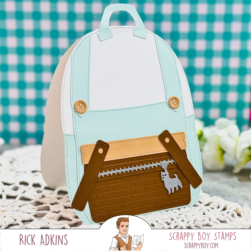 Pastel paper backpack craft with cat charm on a teal checkered background; Rick Adkins and Scrappy Boy Stamps text below.