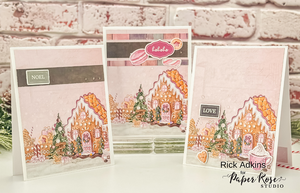 Three Christmas cards with gingerbread houses and candy designs. Texts read "NOEL," "LOVE," and "hohoho." Set against a brick background.