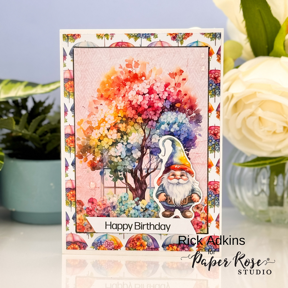 Birthday card with a colorful tree, a gnome, and "Happy Birthday" text. Floral background, surrounded by plants and flowers.
