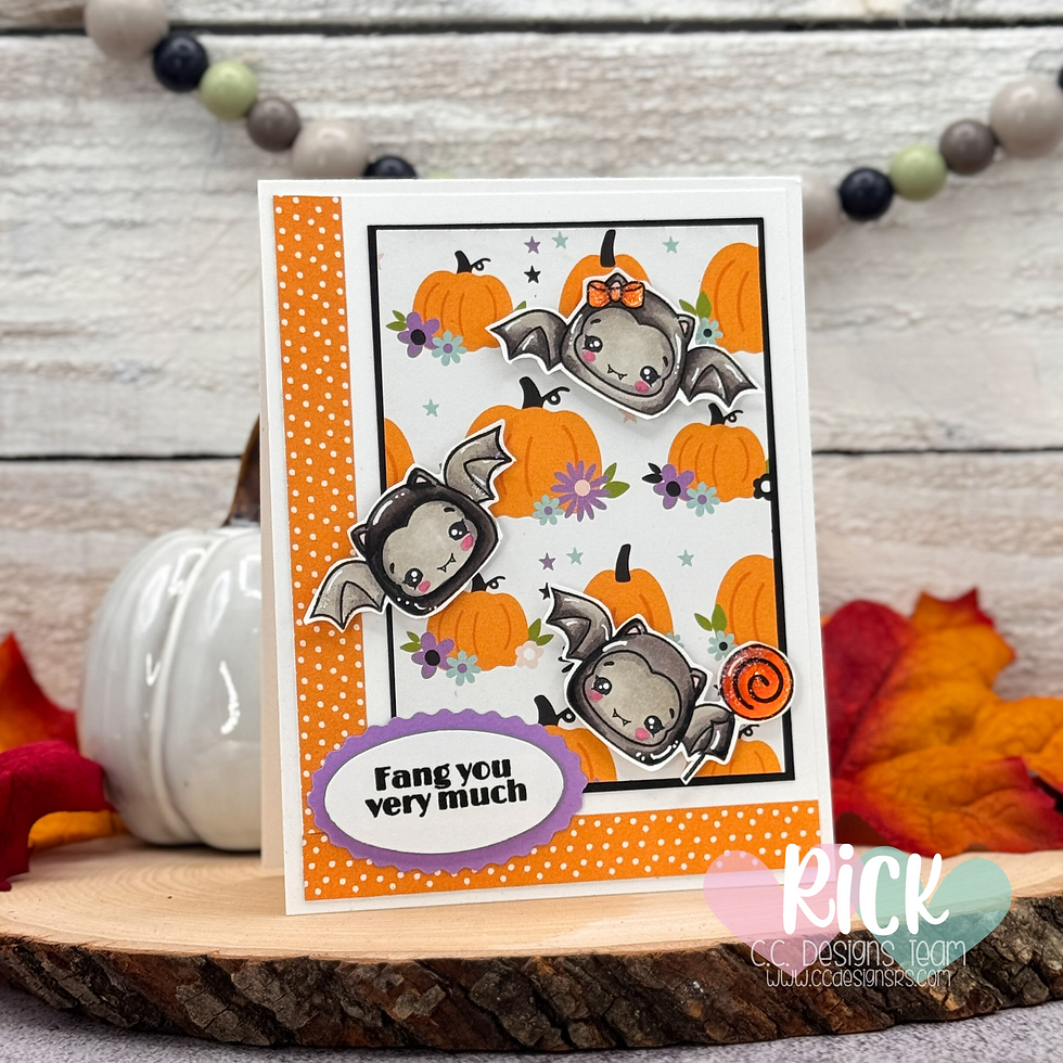 Cute bats with pumpkins on a polka dot card say "Fang you very much." Autumn leaves in background; Halloween theme.