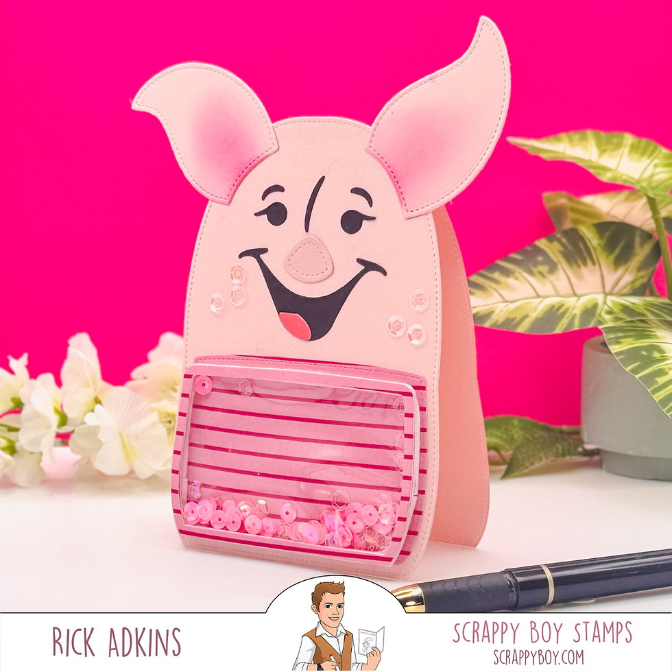 Pink pig-shaped card with sequins, smiling face, pink background, and plants. Text: Rick Adkins, Scrappy Boy Stamps, scrappyboy.com.
