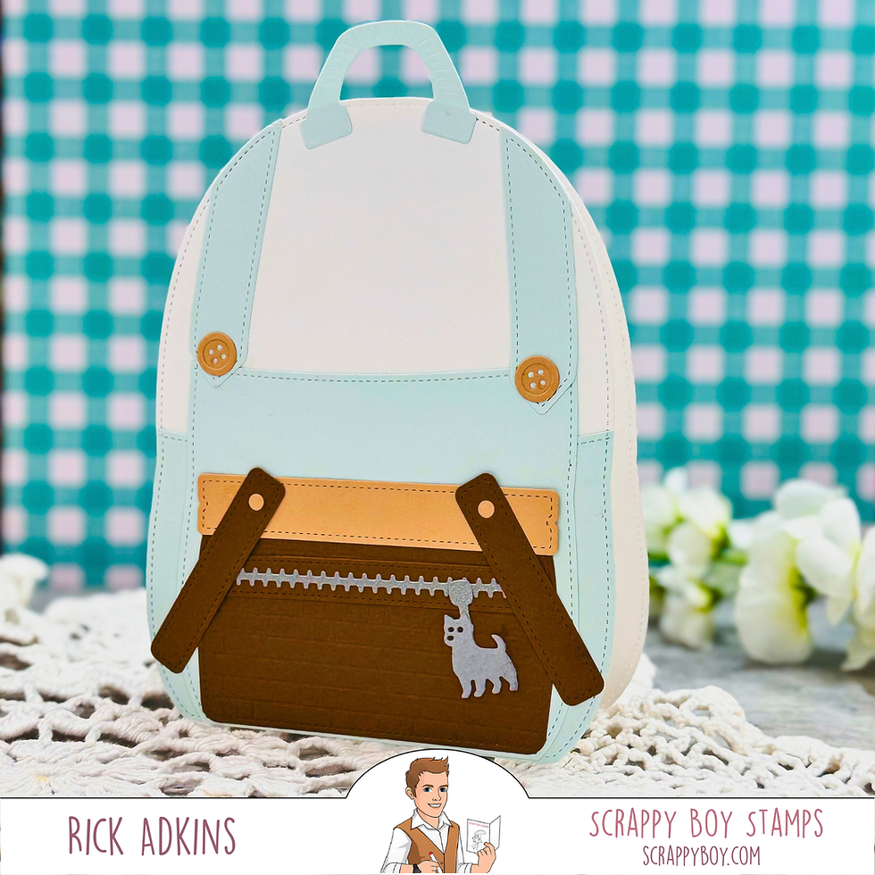 Paper craft backpack with buttons and zipper charm on a teal checkered background; text reads Rick Adkins and Scrappy Boy Stamps.
