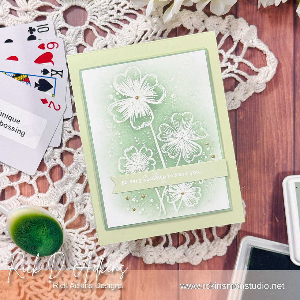 Green floral card with embossed flowers, "So very lucky to know you." Deck of cards nearby on lace fabric, warm wood background.