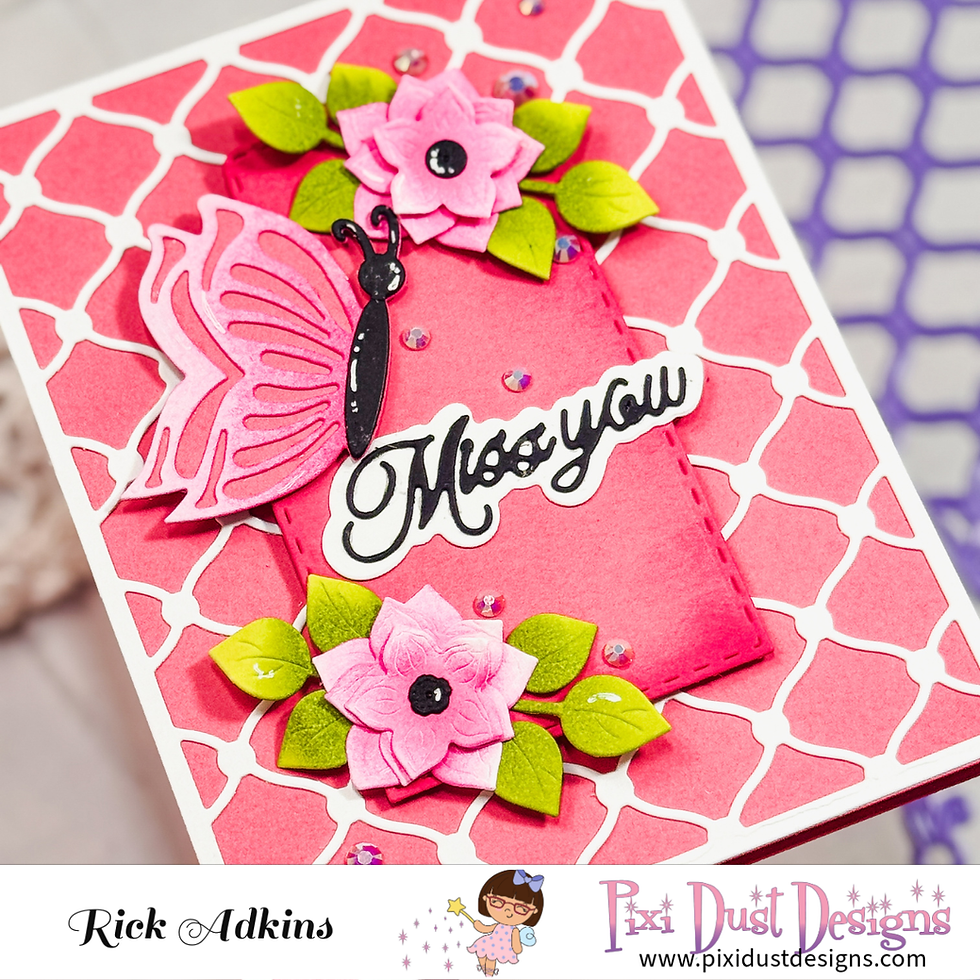 Handmade pink floral card design with pink butterfly pink flowers with green leaves and a miss you sentiment