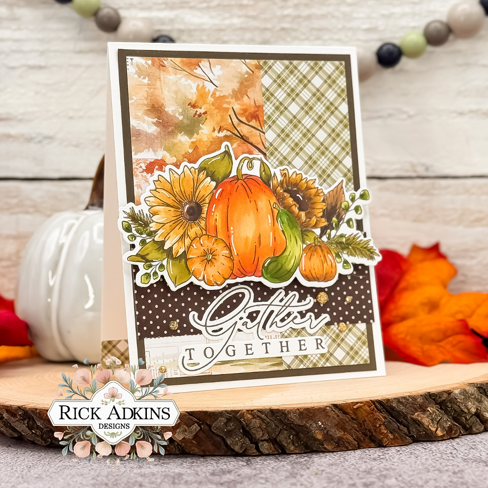 Card with pumpkins, sunflowers, and autumn leaves. Plaid and polka dot patterns. Text reads "Gather Together." Cozy fall theme.