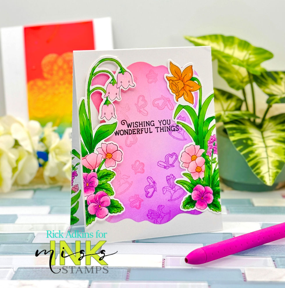 Floral card with pink, orange flowers, text "Wishing You Wonderful Things" on pink background. Bright, cheerful mood. Nearby are plants and a pen.