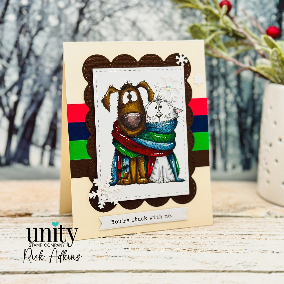 Handmade winter card with a dog and cat wrapped in a colorful scarf, snowflakes, and the text You’re stuck with me.