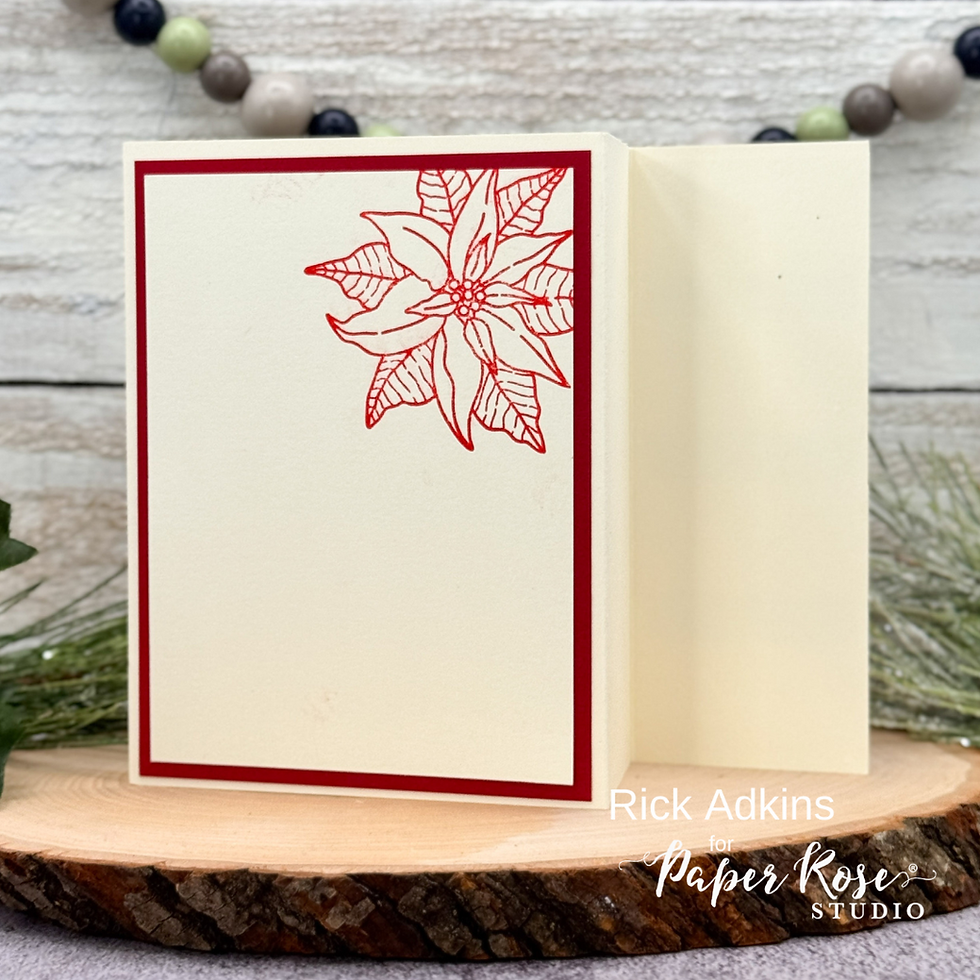 Cream card with red poinsettia design on wooden slice. Background has beaded garland and greenery. Text reads Rick Adkins for Paper Rose Studio.