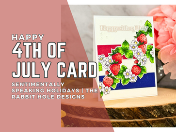 4th of July card with strawberries and flowers on red, white, and blue stripes. Text reads "Happy 4th of July." Set on wooden surface.