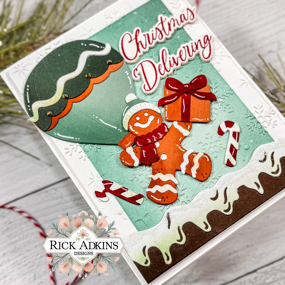 Gingerbread man holding gift with candy canes, next to a green balloon on a card. Text: "Christmas Delivering". Snowflake background.