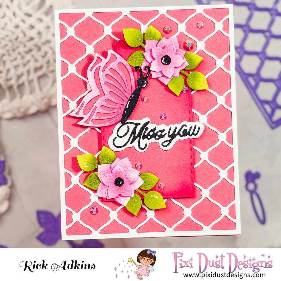 Handmade pink floral card design with pink butterfly pink flowers with green leaves and a miss you sentiment