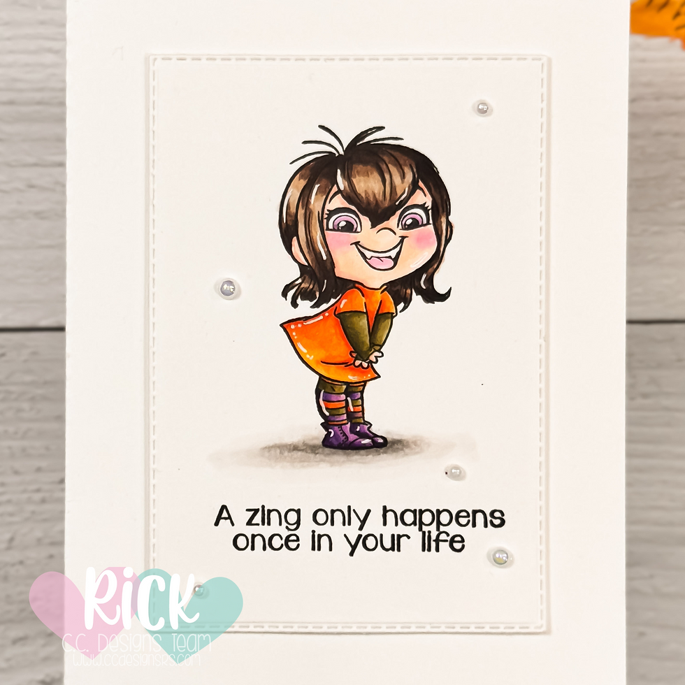 Cartoon girl in an orange dress smiling, with hands behind her back. Text below says "A zing only happens once in your life."