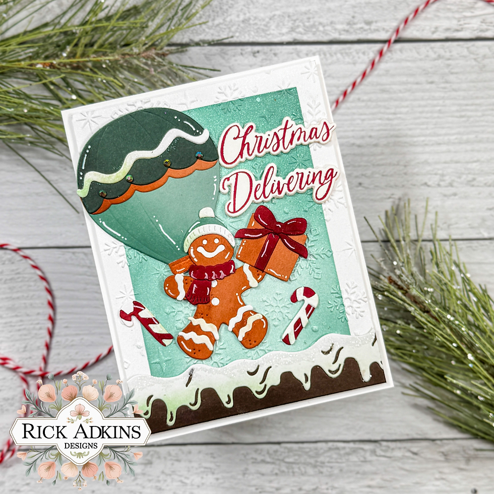 Festive card with a gingerbread man holding a gift, candy canes, and hot air balloon. Text: "Christmas Delivering." Snowy, festive design.