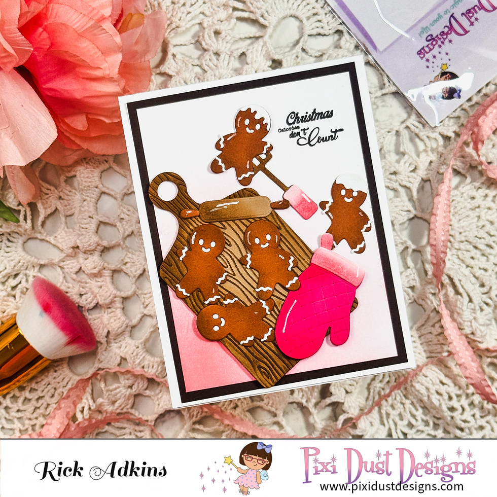 Christmas card with gingerbread men on a sled and pink oven mitt; text says Christmas calories don’t count.