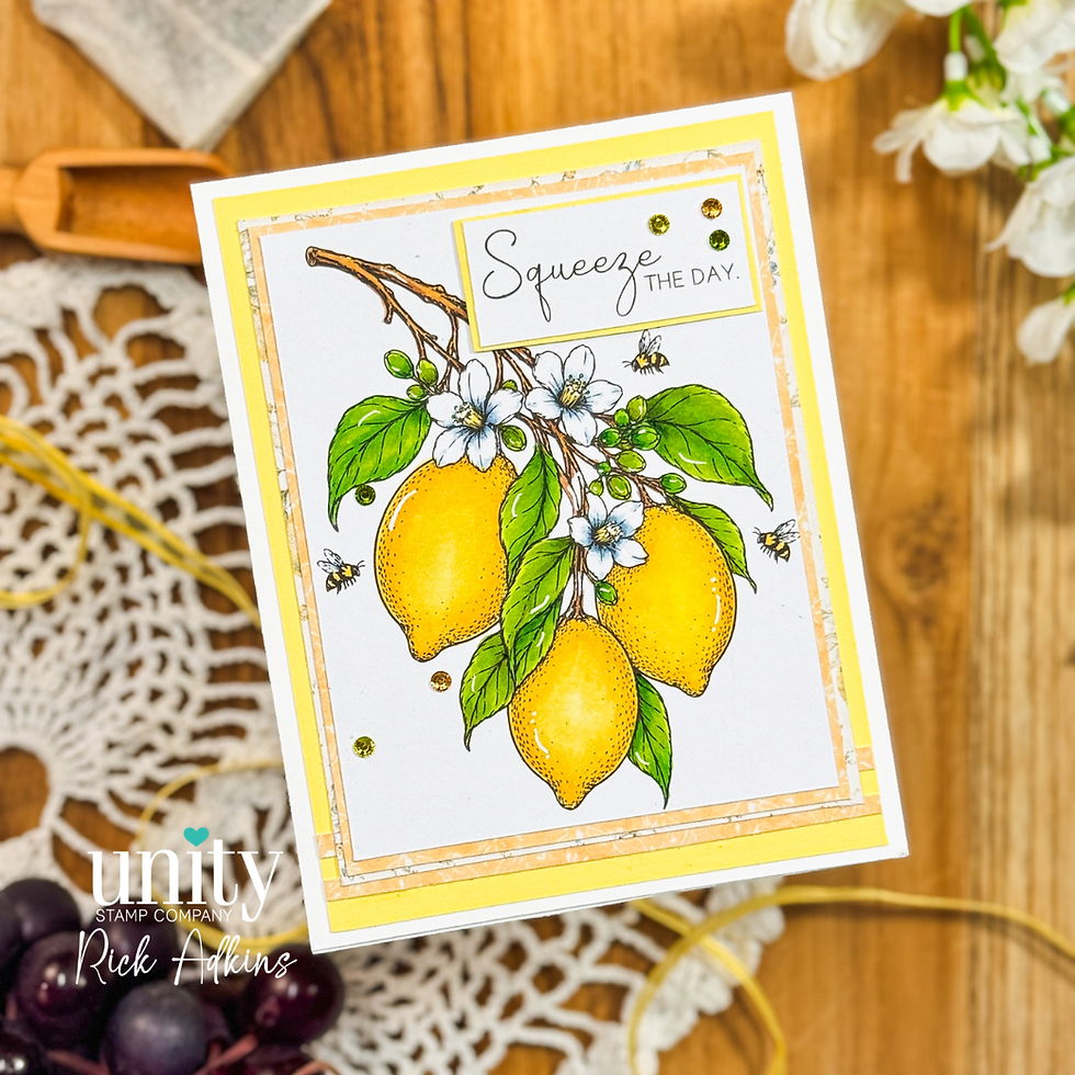 Lemon card with flowers and bees, labeled Squeeze the Day, on a wooden table with lace and craft supplies.