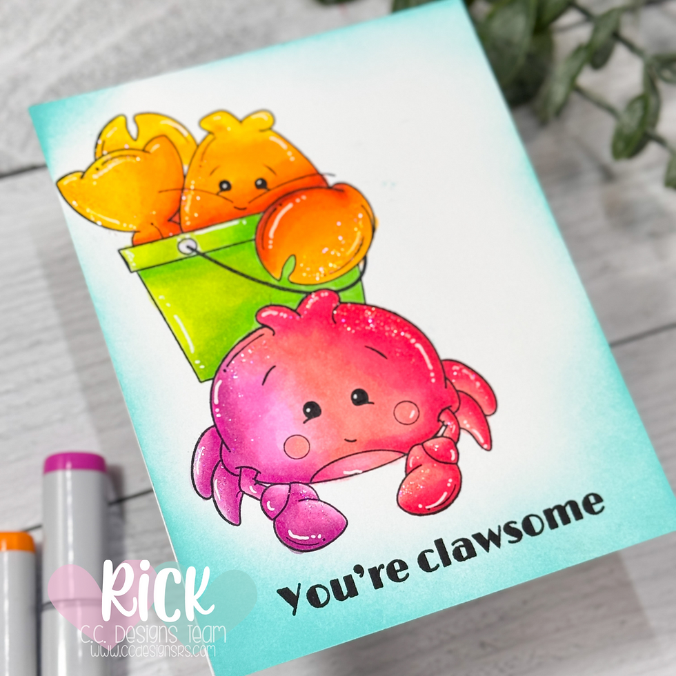 Cute pink and orange crab in a green bucket on a card. Text reads "You're clawsome." Bright, joyful colors with markers nearby.